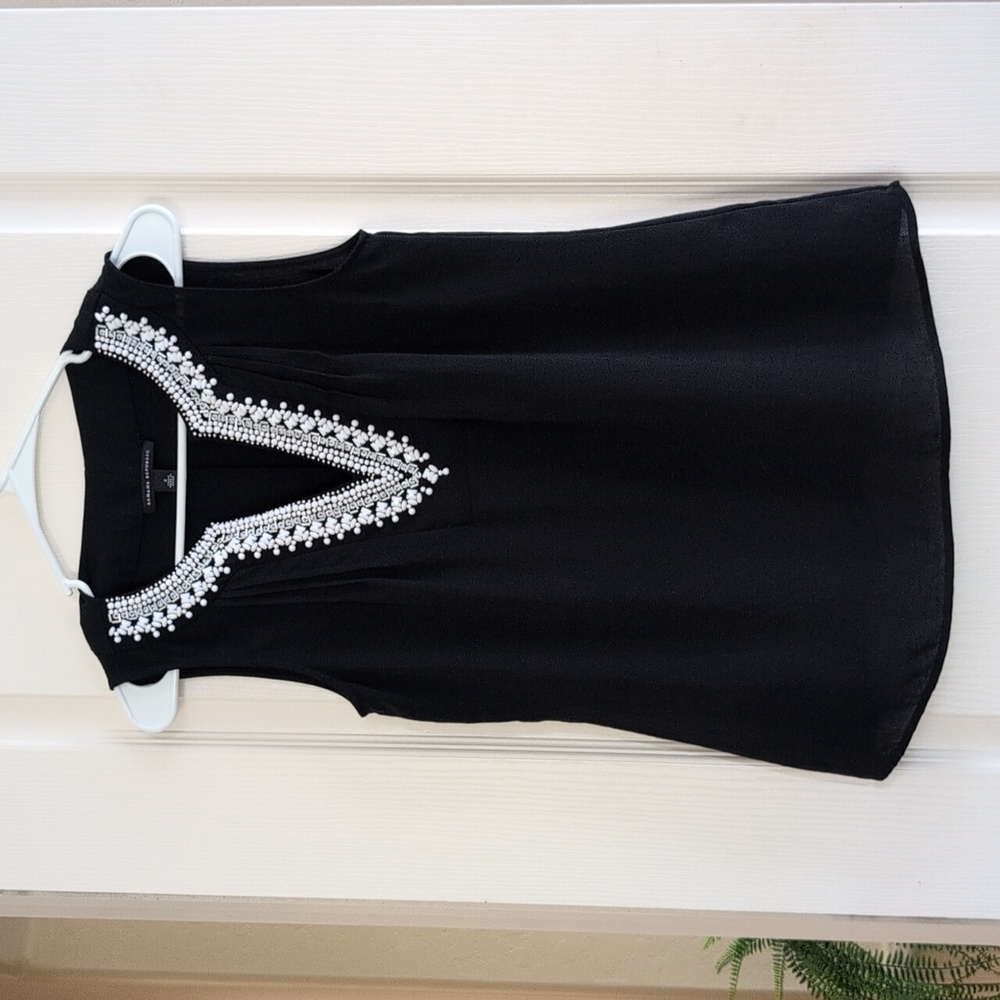 Navy Sleeveless Top with Embellished Neckline